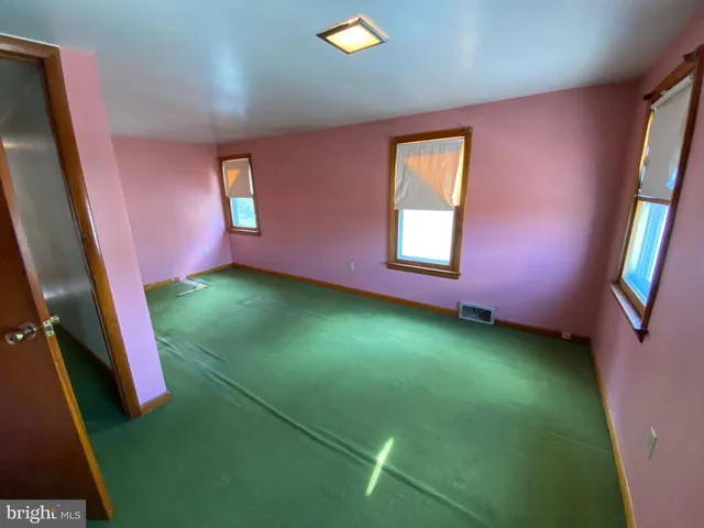 a view of a livingroom with furniture and window