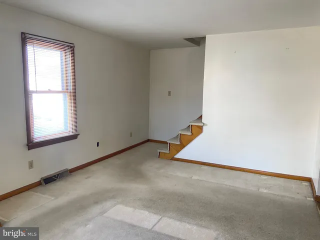 an empty room with a window