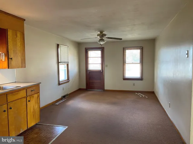 a view of a livingroom with a window