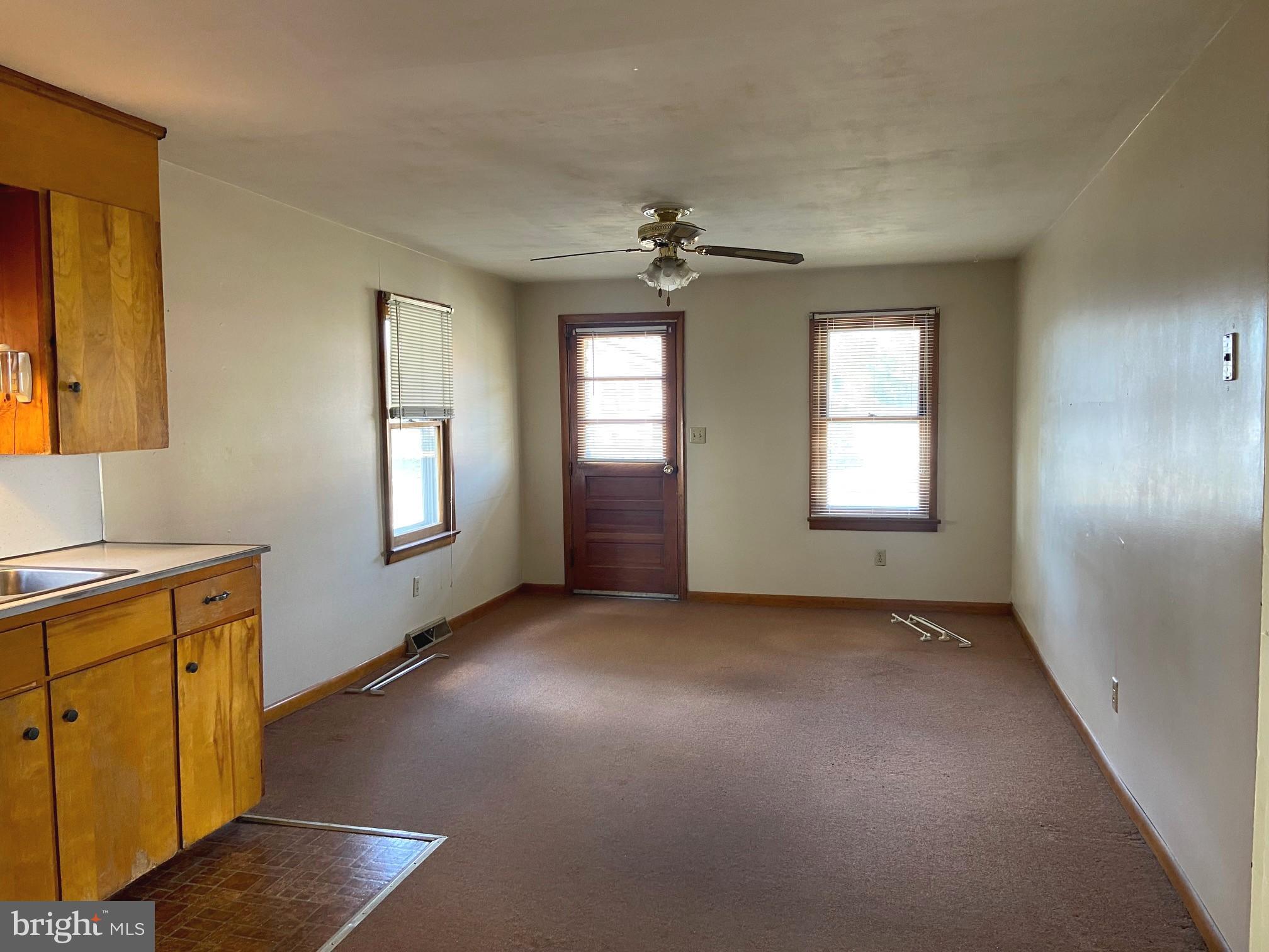 74 South Broadway Pennsville, NJ 08070 - Photo 5 of 22 a view of a livingroom with a window