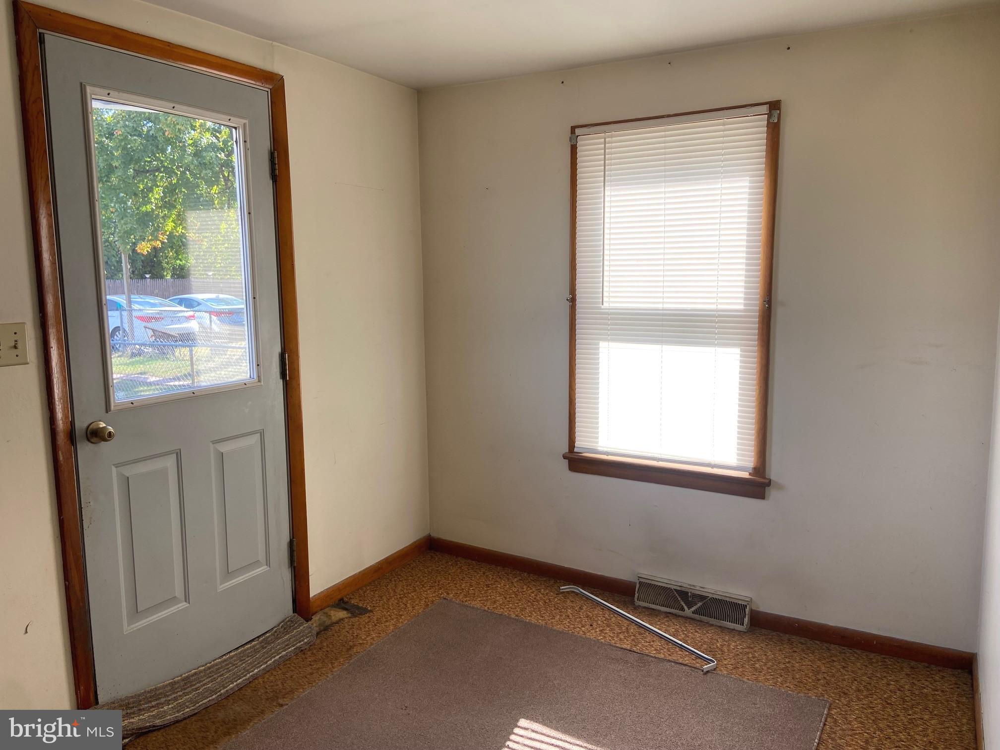74 South Broadway Pennsville, NJ 08070 - Photo 7 of 22 an empty room with a window