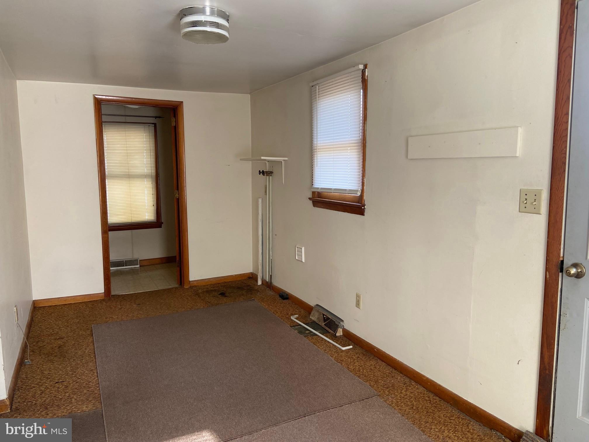 74 South Broadway Pennsville, NJ 08070 - Photo 8 of 22 an empty room with windows