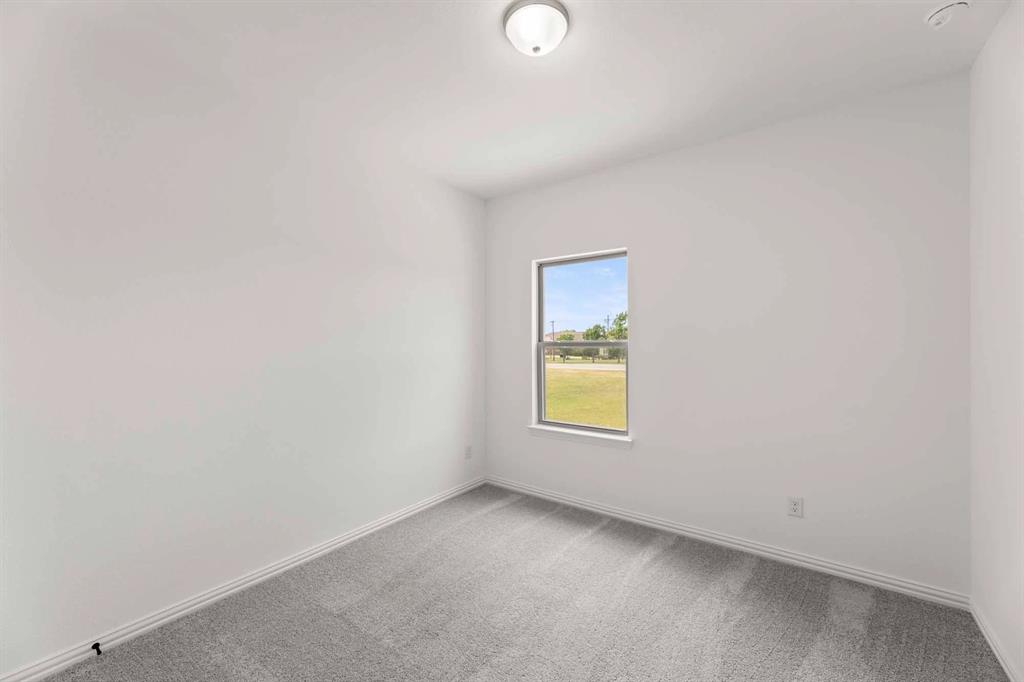 631 Blue Rdg Drive Mansfield, TX 76063 - Photo 16 of 30 an empty room with a window