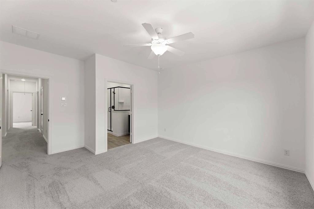 631 Blue Rdg Drive Mansfield, TX 76063 - Photo 20 of 30 a view of a livingroom with a chandelier fan and kitchen view