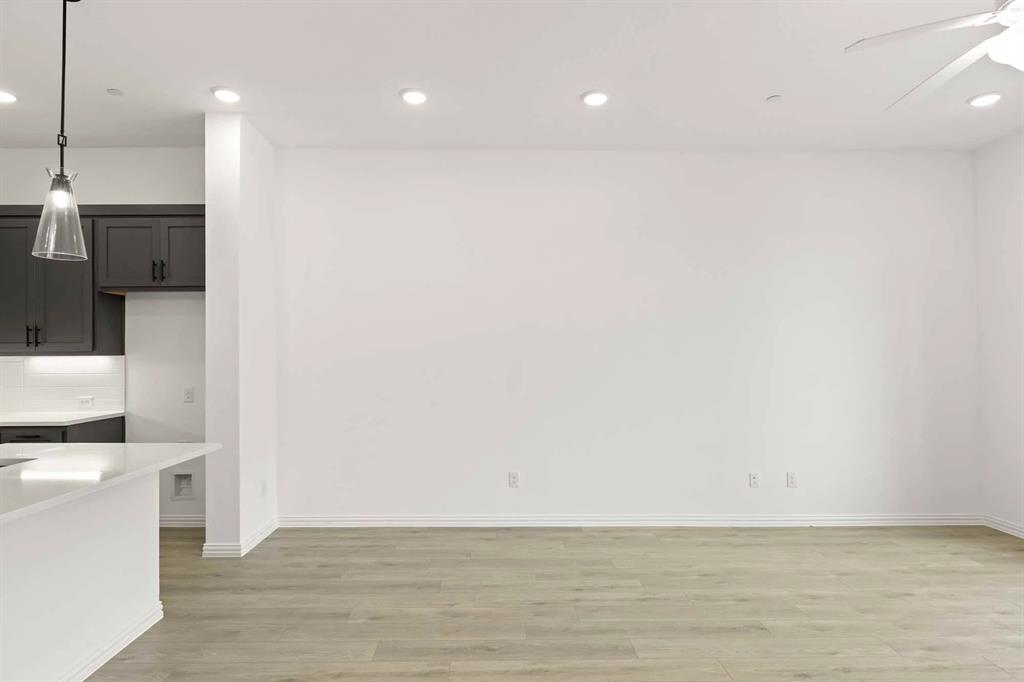 631 Blue Rdg Drive Mansfield, TX 76063 - Photo 10 of 30 a view of a kitchen with a sink and a stove top oven