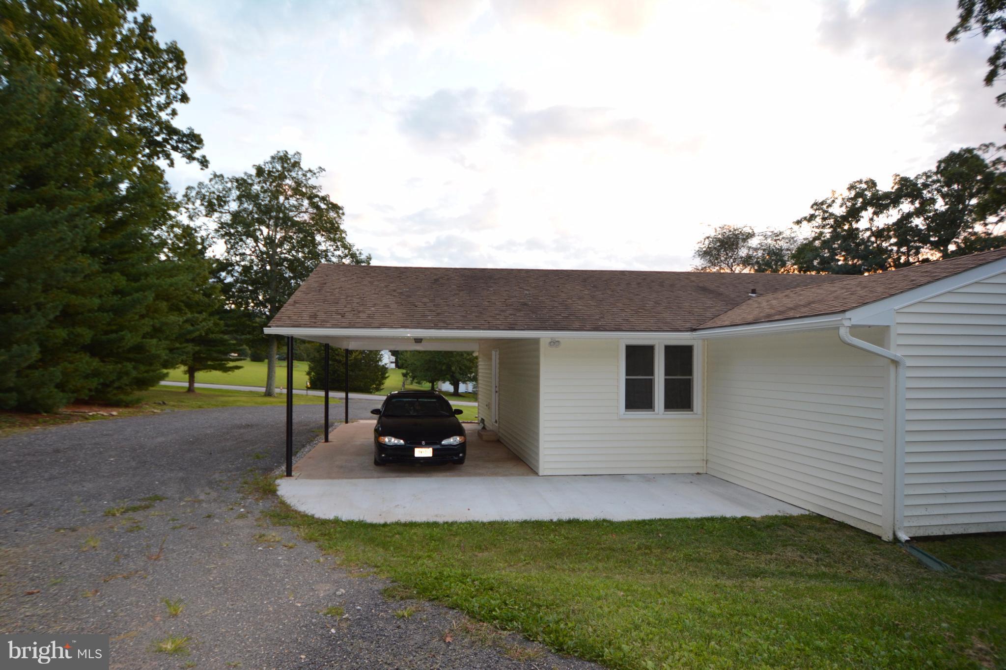5229 Braddock Road Woodbine, MD 21797 - Photo 4 of 30 Patio behind carport. Rear addition to Mstr Bdrm