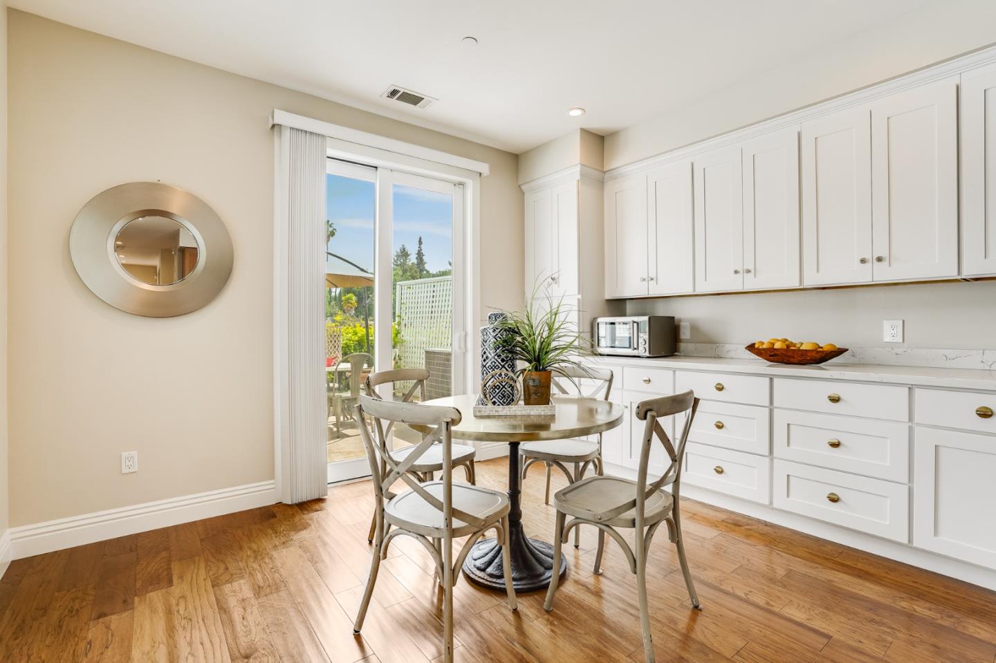 1134 Boranda Avenue Mountain View, CA 94040 - Photo 16 of 40 a view of a dining room with furniture and chandelier