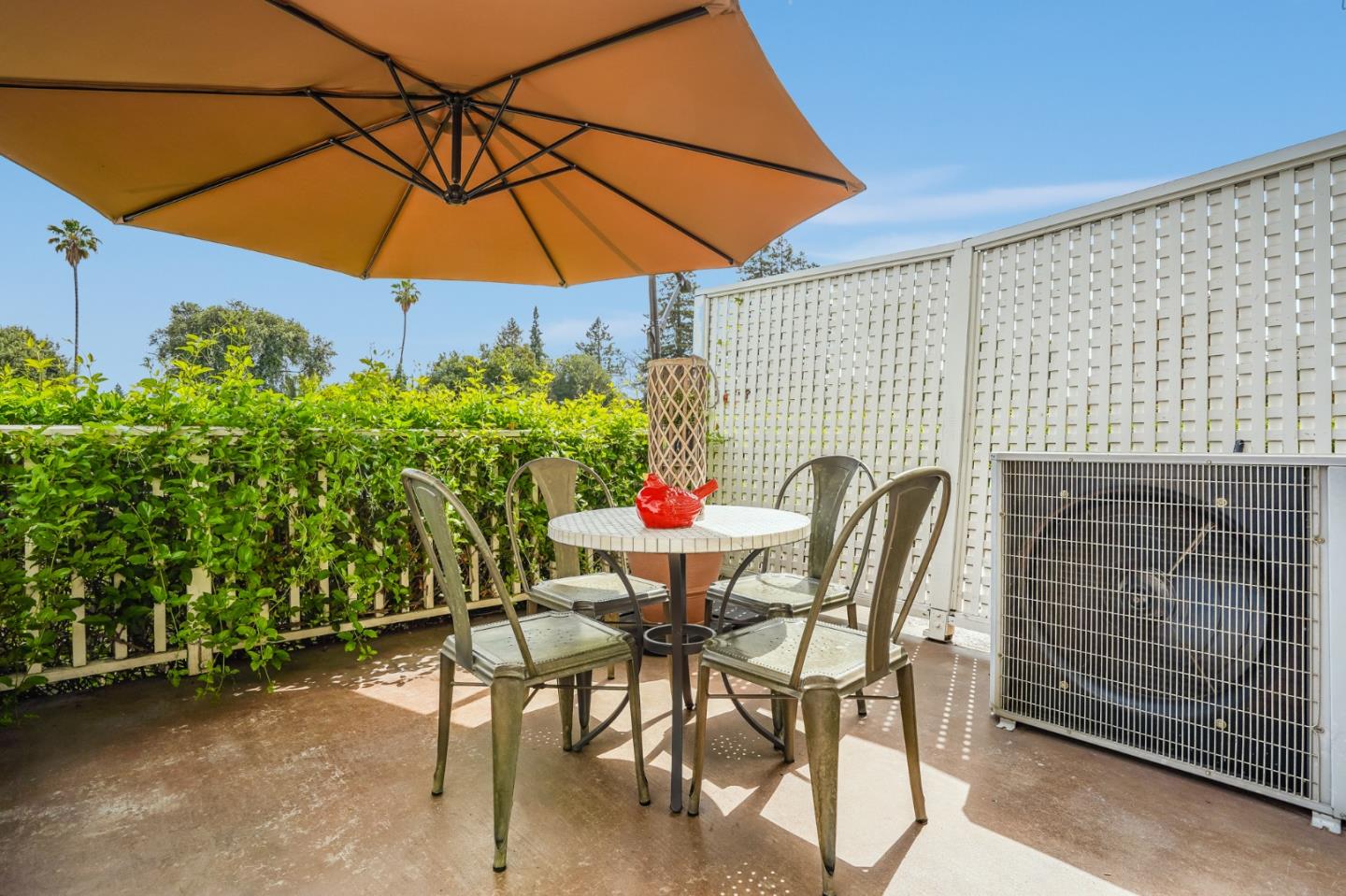 1134 Boranda Avenue Mountain View, CA 94040 - Photo 37 of 40 a patio with a patio table and chairs
