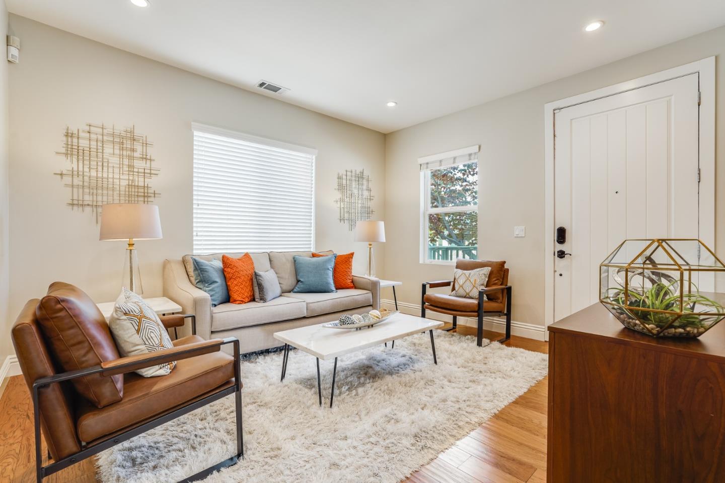1134 Boranda Avenue Mountain View, CA 94040 - Photo 5 of 40 a living room with furniture and wooden floor