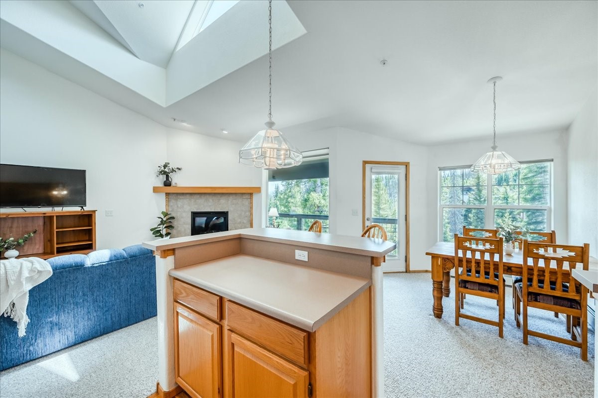 91399 Ryan Gulch Road, Unit B6 Silverthorne, CO 80498 - Photo 11 of 36 a view of a livingroom with furniture window and wooden floor