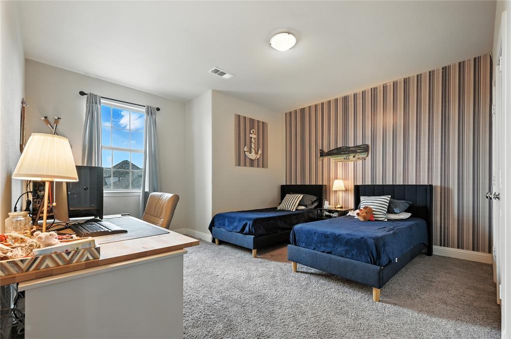 1160 Red Hawk Lane Forney, TX 75126 - Photo 14 of 26 a living room with furniture and a lamp
