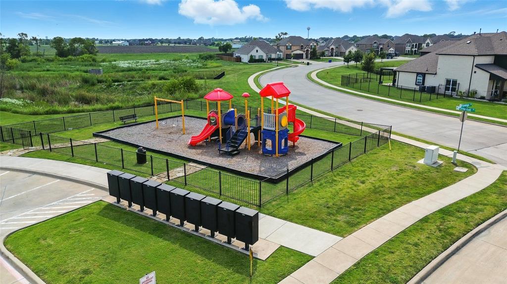 1160 Red Hawk Lane Forney, TX 75126 - Photo 19 of 26 a view of a city from a terrace
