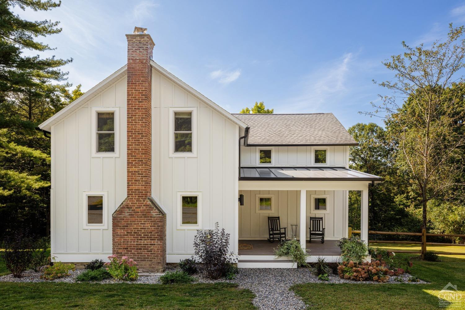 a front view of house with yard