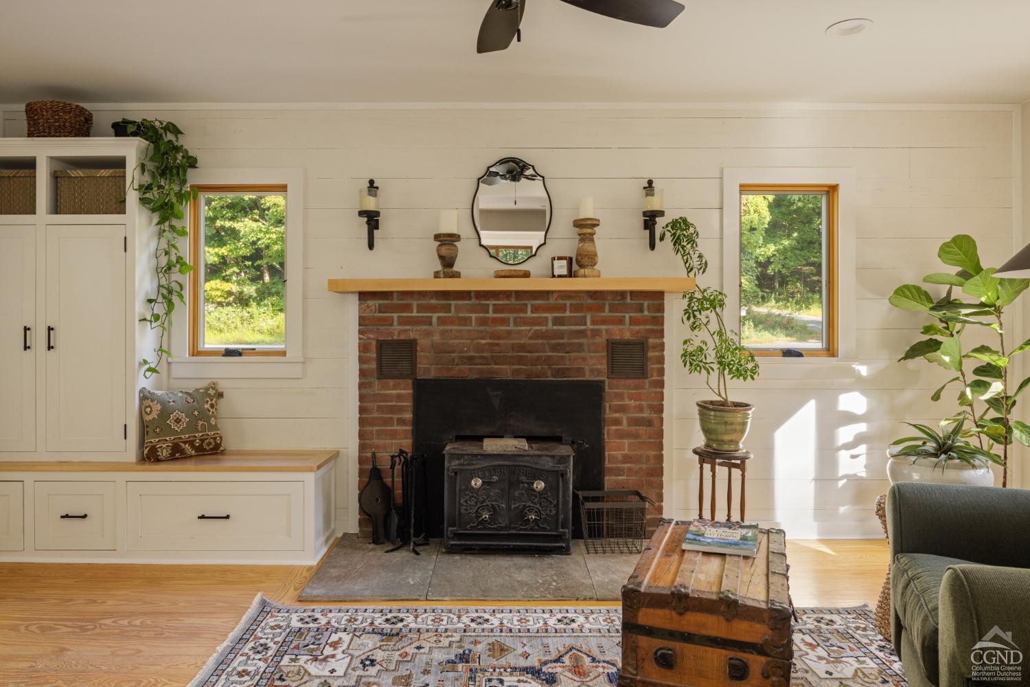 613 Fischer Road Kinderhook, NY 12106 - Photo 5 of 21 a living room with furniture and a fireplace
