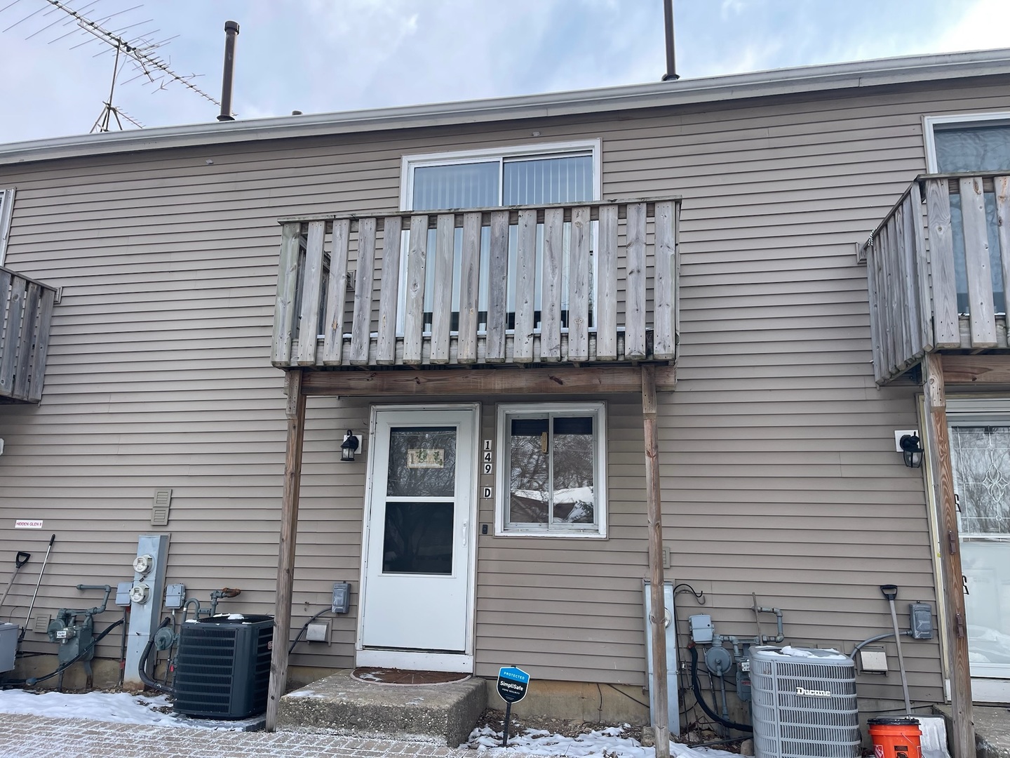 149 Forest Avenue, Unit D Fox Lake, IL 60020 - Photo 4 of 44 a front view of a house with balcony