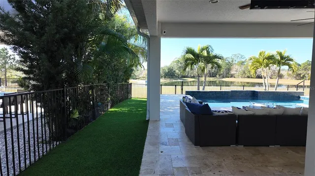 a view of a backyard with plants