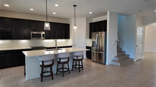 a view of a kitchen and dining room