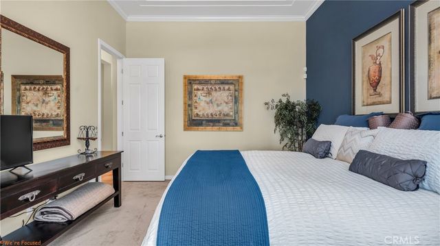 a bathroom with a sink a tub a mirror and shower