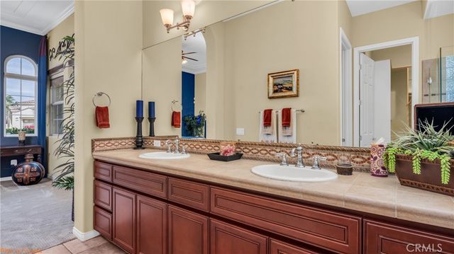 a bathroom with a tub and shower