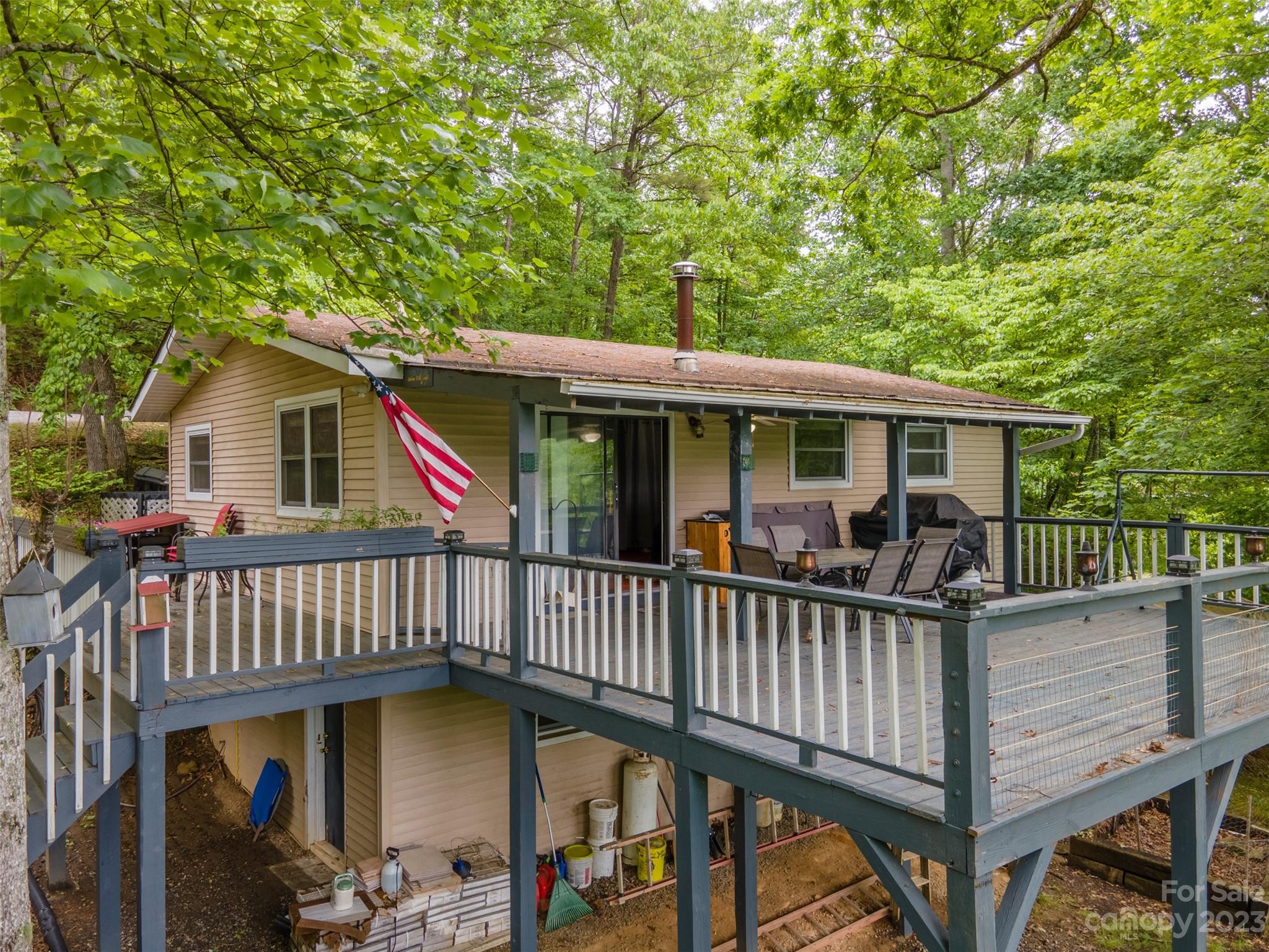 a view of a house with a roof deck