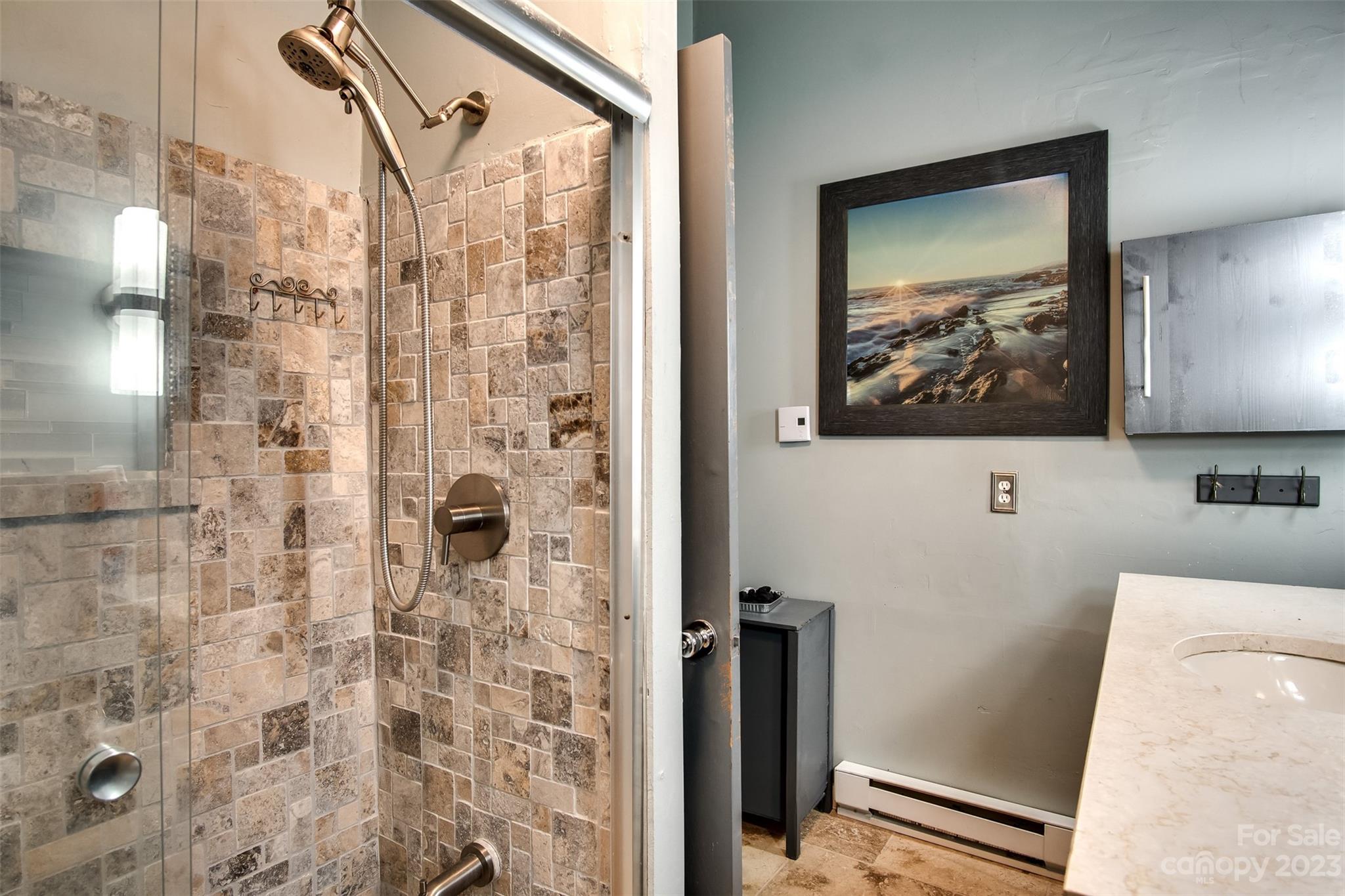 21 Turtle Rock Lane Tuckasegee, NC 28783 - Photo 12 of 32 a bathroom with a shower and a sink
