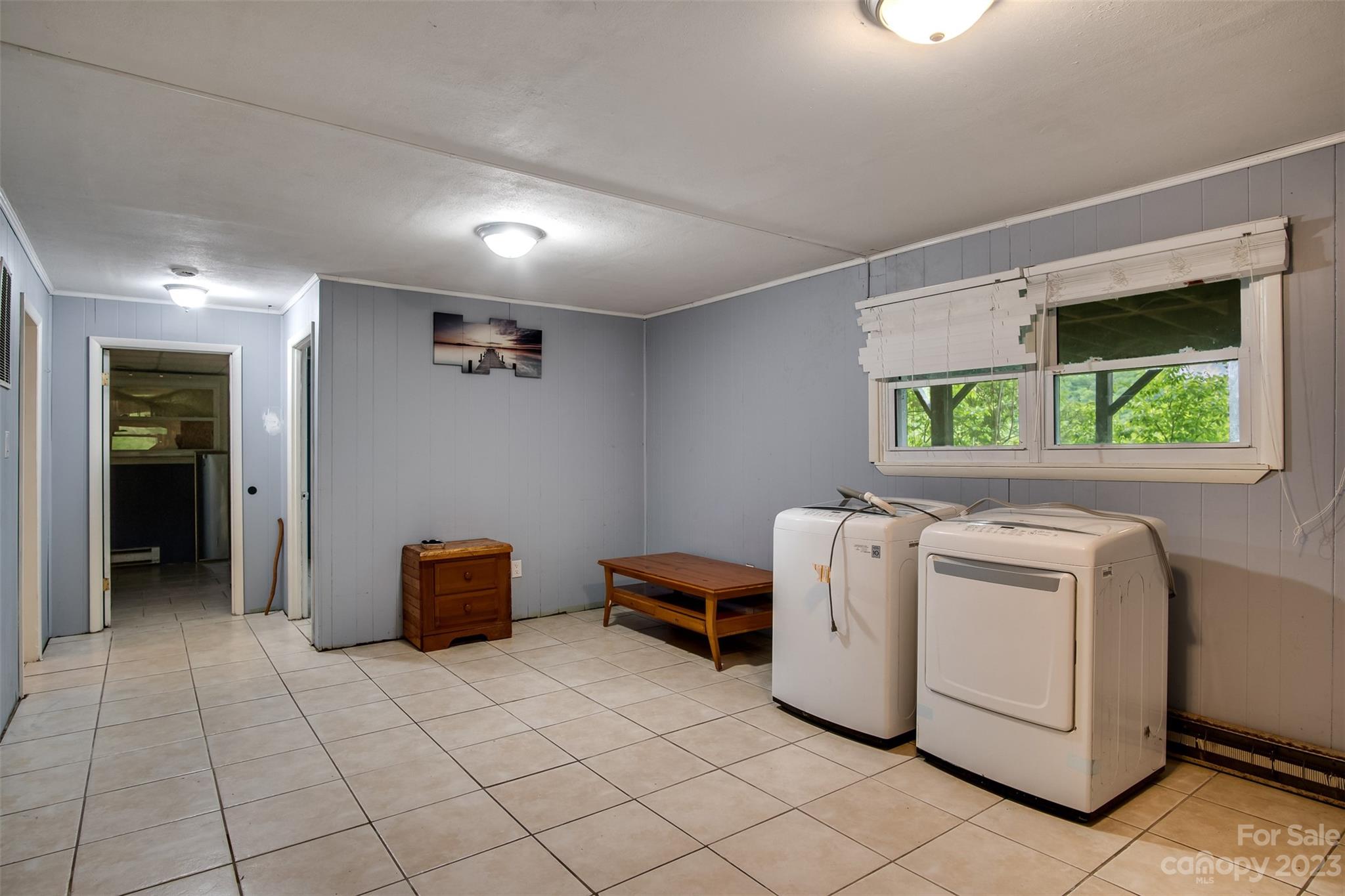 21 Turtle Rock Lane Tuckasegee, NC 28783 - Photo 13 of 32 a utility room with dryer and washer