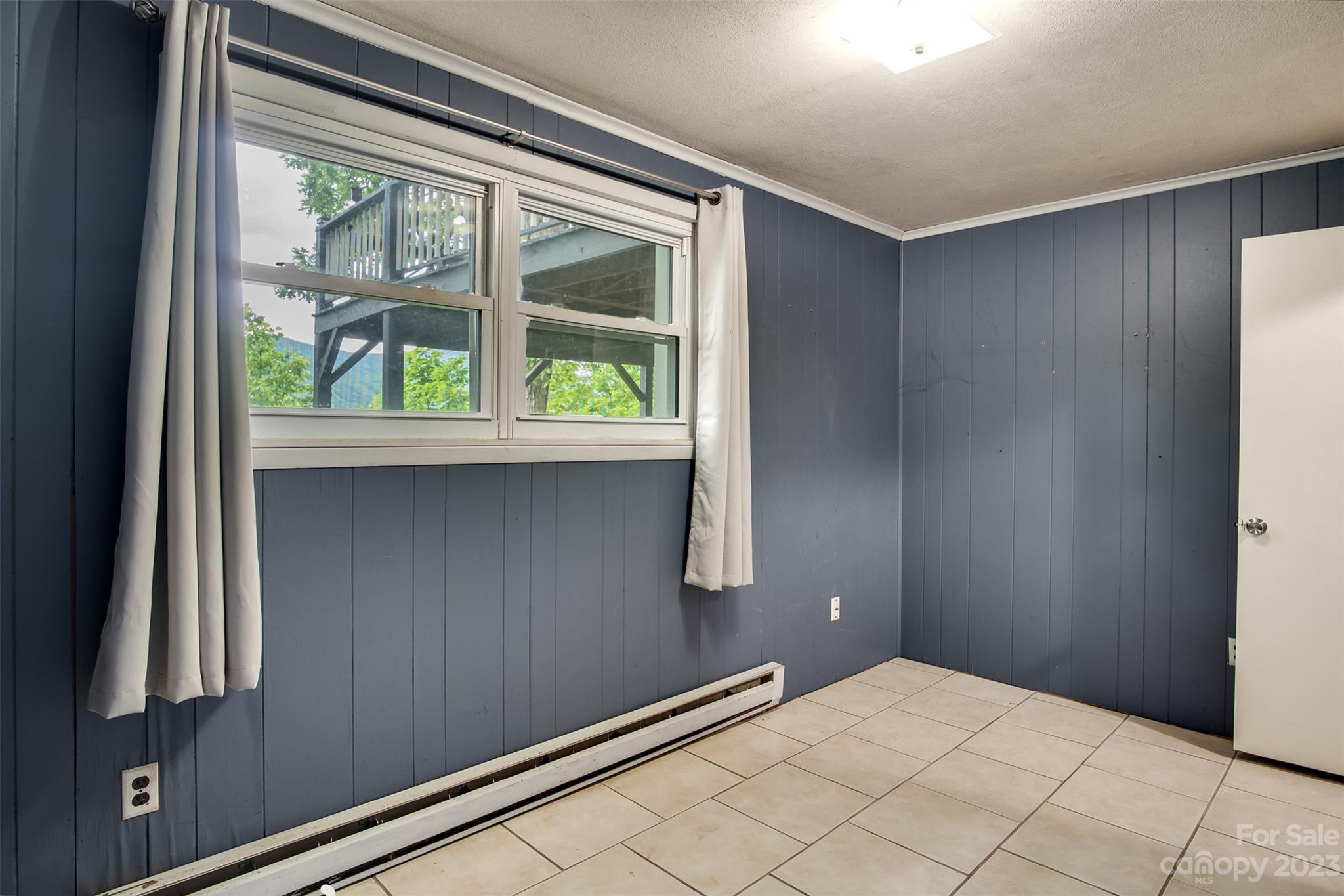 21 Turtle Rock Lane Tuckasegee, NC 28783 - Photo 18 of 32 a view of an empty room with a window