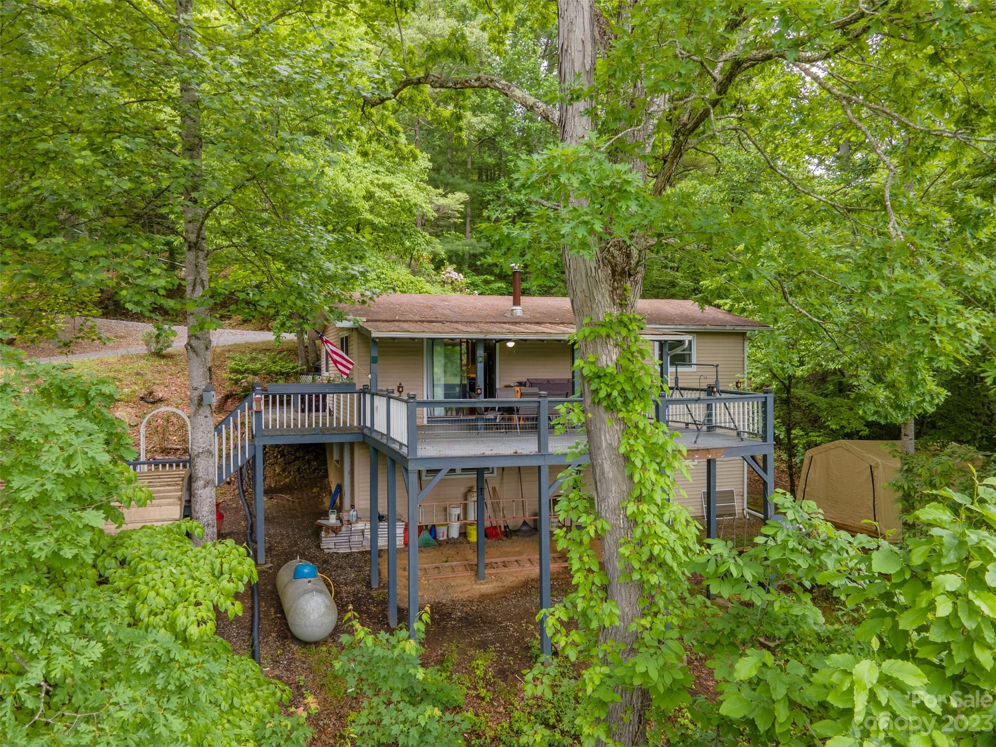 21 Turtle Rock Lane Tuckasegee, NC 28783 - Photo 29 of 32 an aerial view of a house with outdoor space patio and outdoor seating