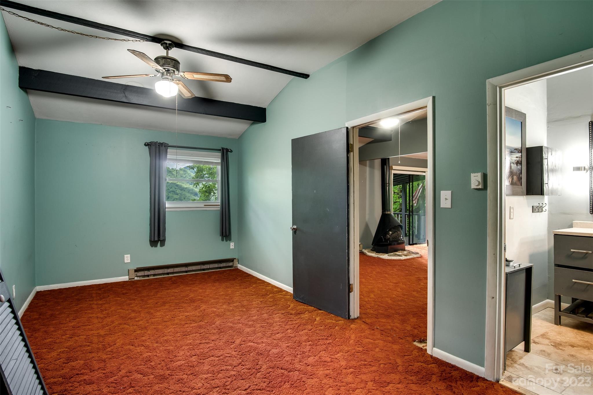 21 Turtle Rock Lane Tuckasegee, NC 28783 - Photo 10 of 32 an empty room with closet and windows