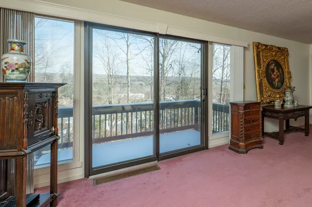 a view of a livingroom with furniture