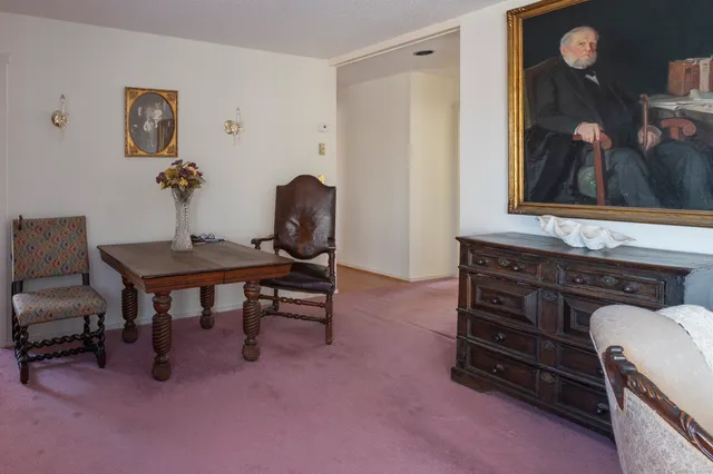 a view of a workspace with furniture