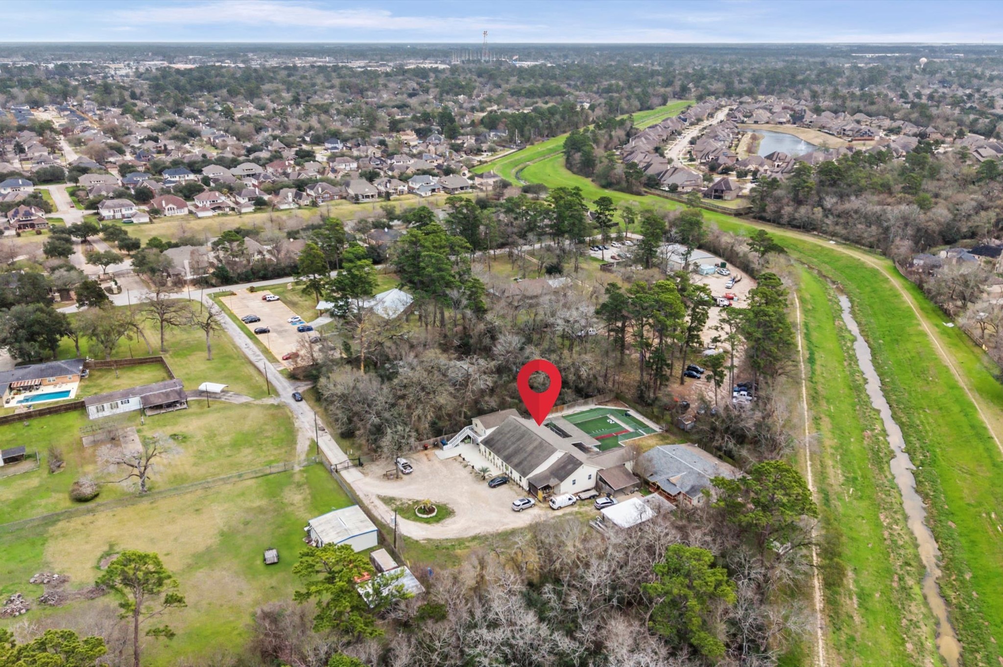 an aerial view of residential houses with outdoor space