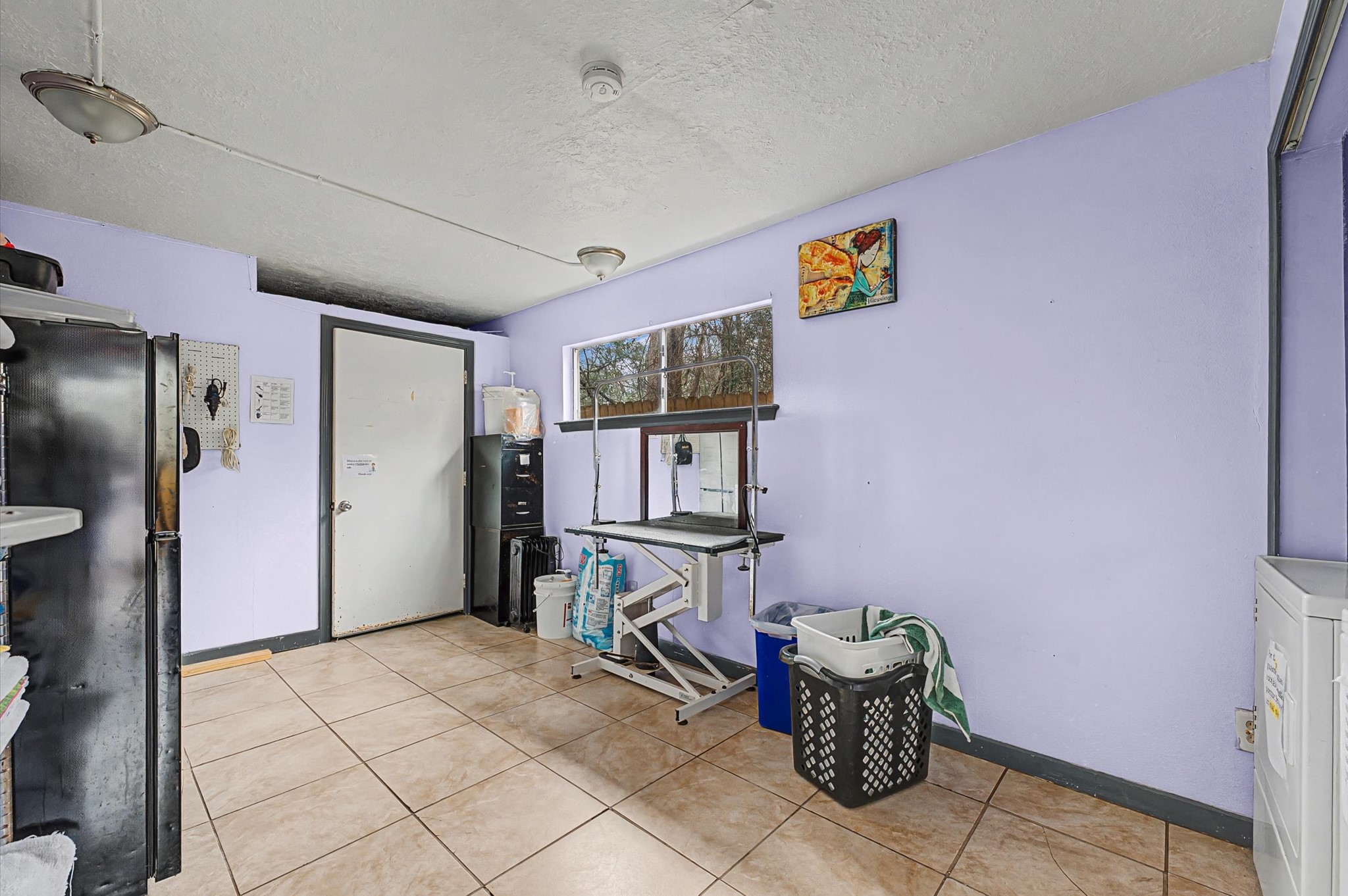19417 Haude Road Spring, TX 77388 - Photo 11 of 29 a kitchen with stainless steel appliances kitchen island granite countertop a refrigerator and a stove