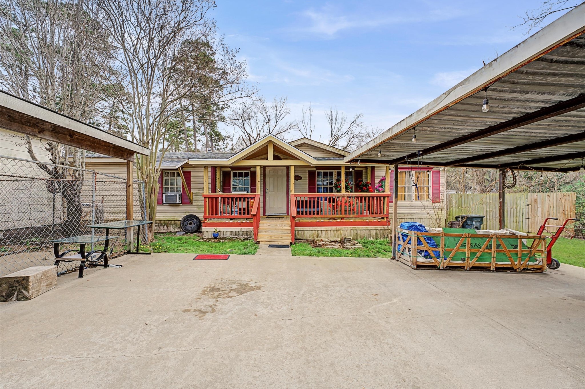 19417 Haude Road Spring, TX 77388 - Photo 24 of 29 a front view of a house with porch and garden