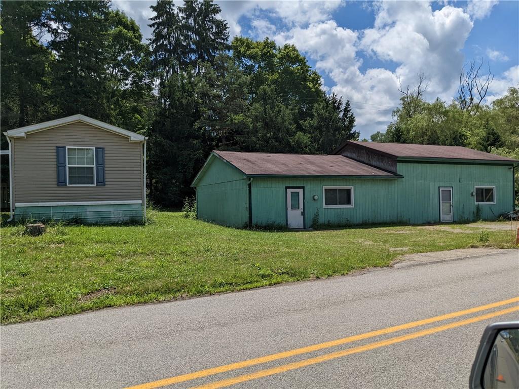 401 Keck Road Butler, PA 16002 - Photo 3 of 13 a view of a house with a yard
