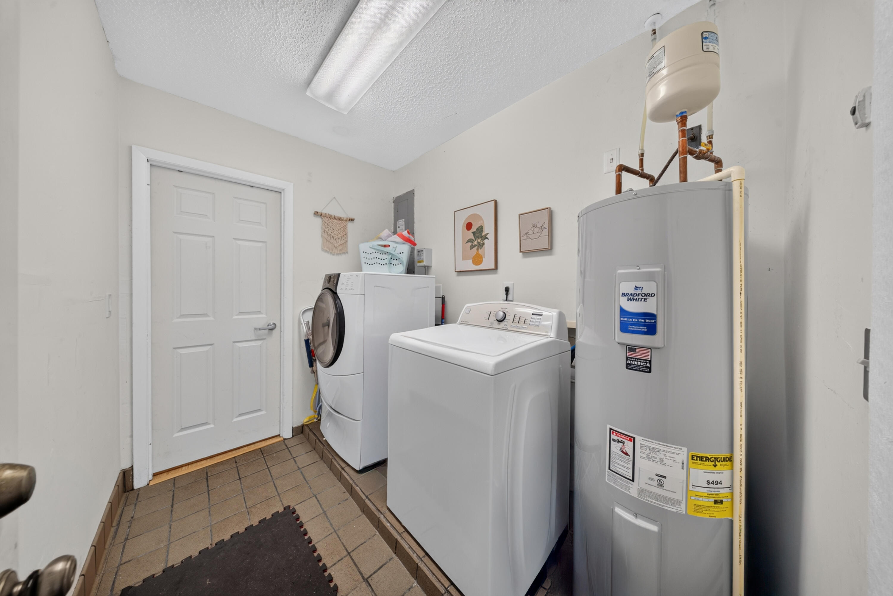 6007 Raintree Trail Fort Pierce, FL 34982 - Photo 28 of 35 Laundry Room