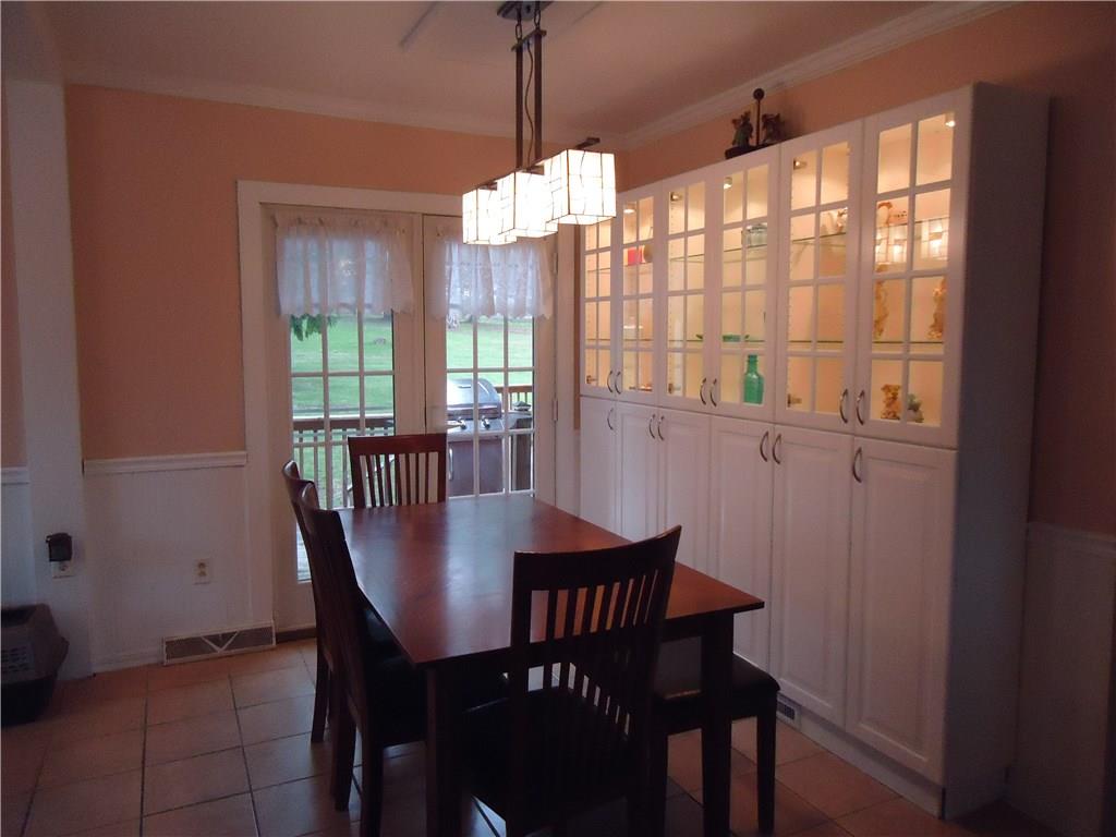 1525 Harvey Run Road Freedom, PA 15042 - Photo 3 of 24 12x9 dining area open to kitchen with French doors to deck.