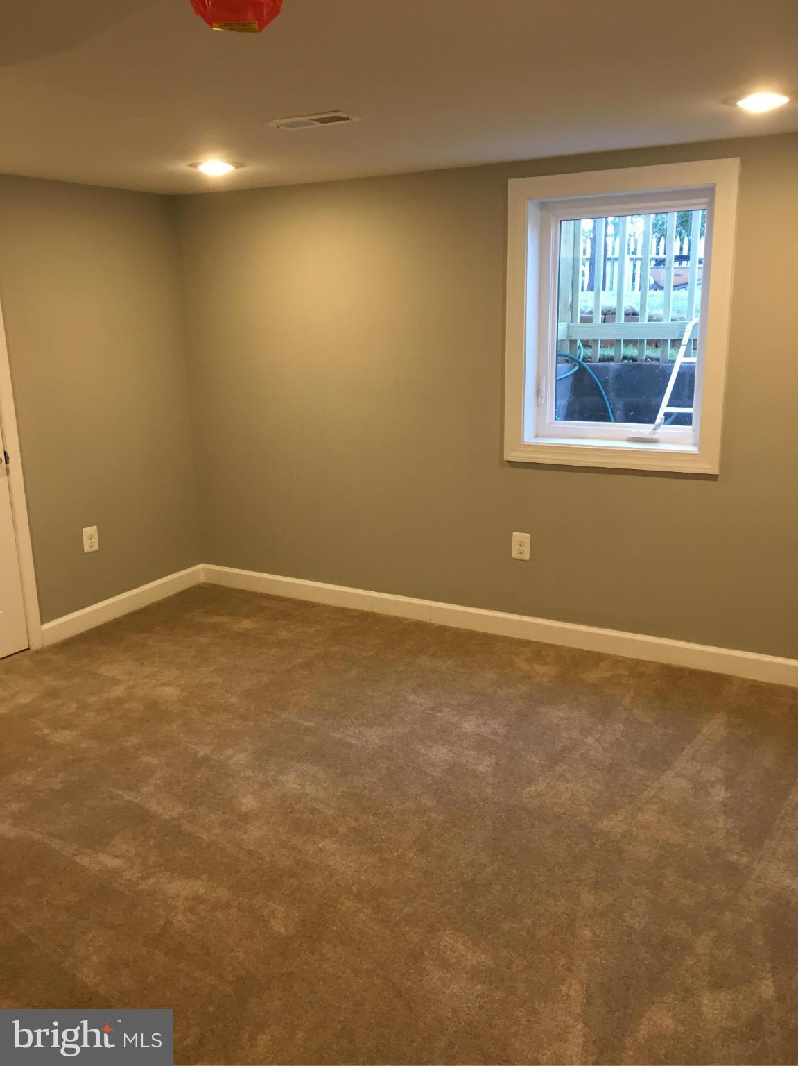 620 Woodside Parkway Silver Spring, MD 20910 - Photo 9 of 11 a view of an empty room with a window