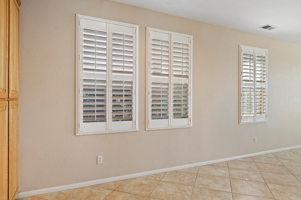 1533 Brookside Court San Marcos, CA 92078 - Photo 17 of 46 a view of an empty room with a window