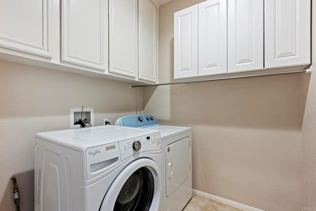 1533 Brookside Court San Marcos, CA 92078 - Photo 28 of 46 a utility room with dryer and washer