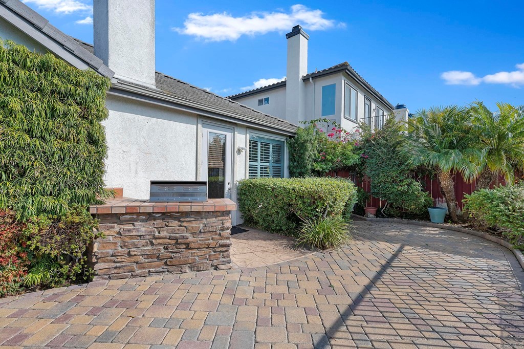 1533 Brookside Court San Marcos, CA 92078 - Photo 41 of 46 a front view of a house with garden