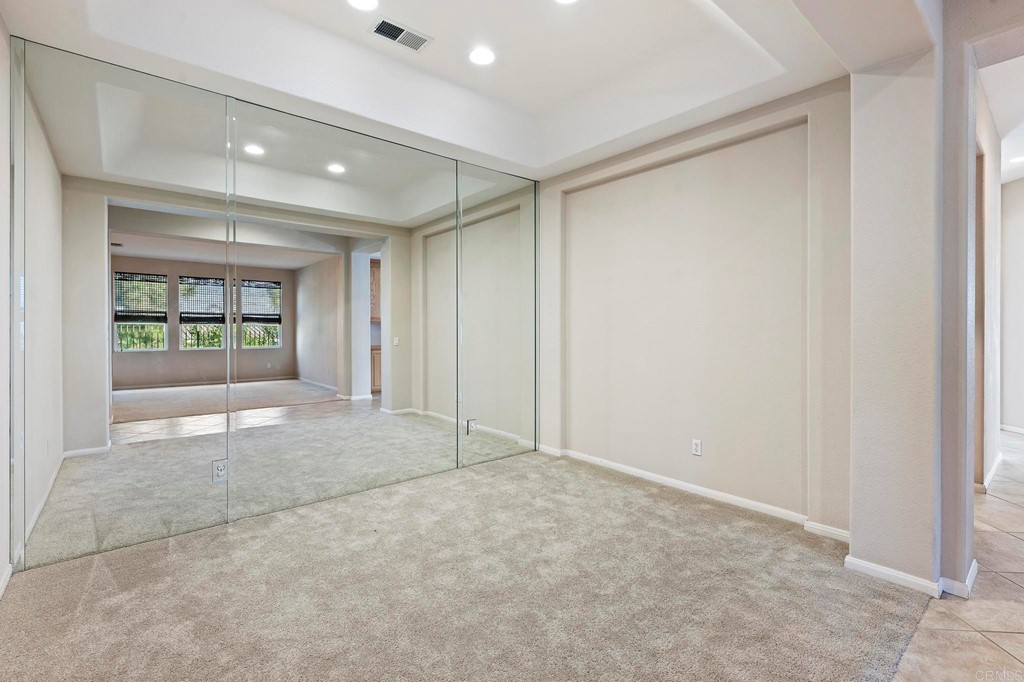 1533 Brookside Court San Marcos, CA 92078 - Photo 8 of 46 a view of an empty room with a window