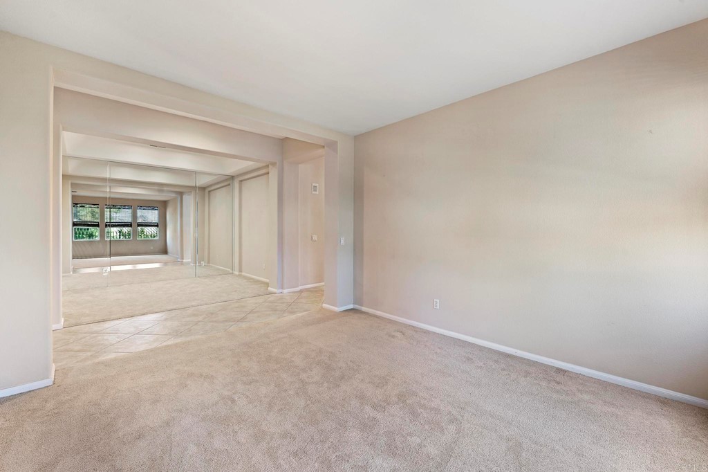 1533 Brookside Court San Marcos, CA 92078 - Photo 9 of 46 a view of an empty room with a window