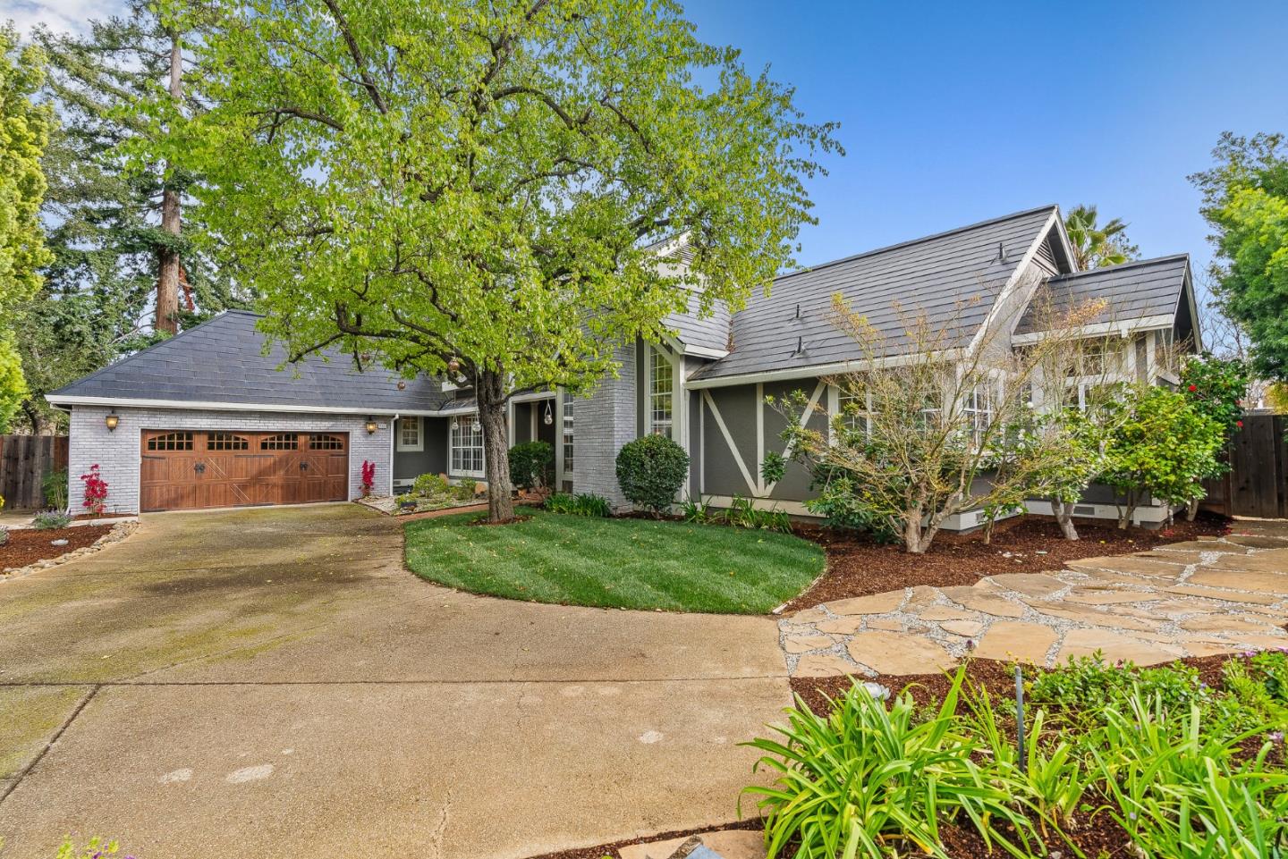 15650 Michael Lane Monte Sereno, CA 95030 - Photo 1 of 54 front view of a house with a garden
