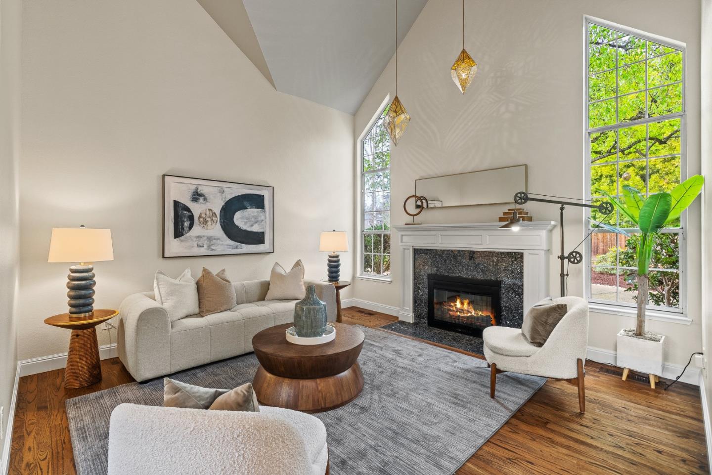 15650 Michael Lane Monte Sereno, CA 95030 - Photo 11 of 54 a living room with furniture and a fireplace