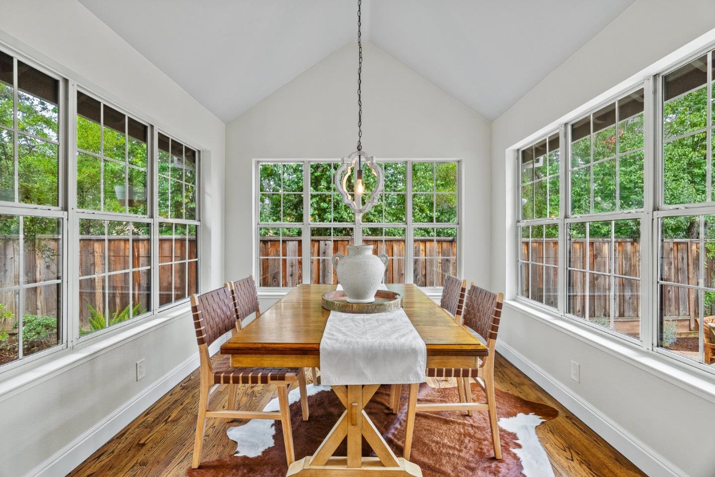 15650 Michael Lane Monte Sereno, CA 95030 - Photo 16 of 54 a living room with furniture and a floor to ceiling window