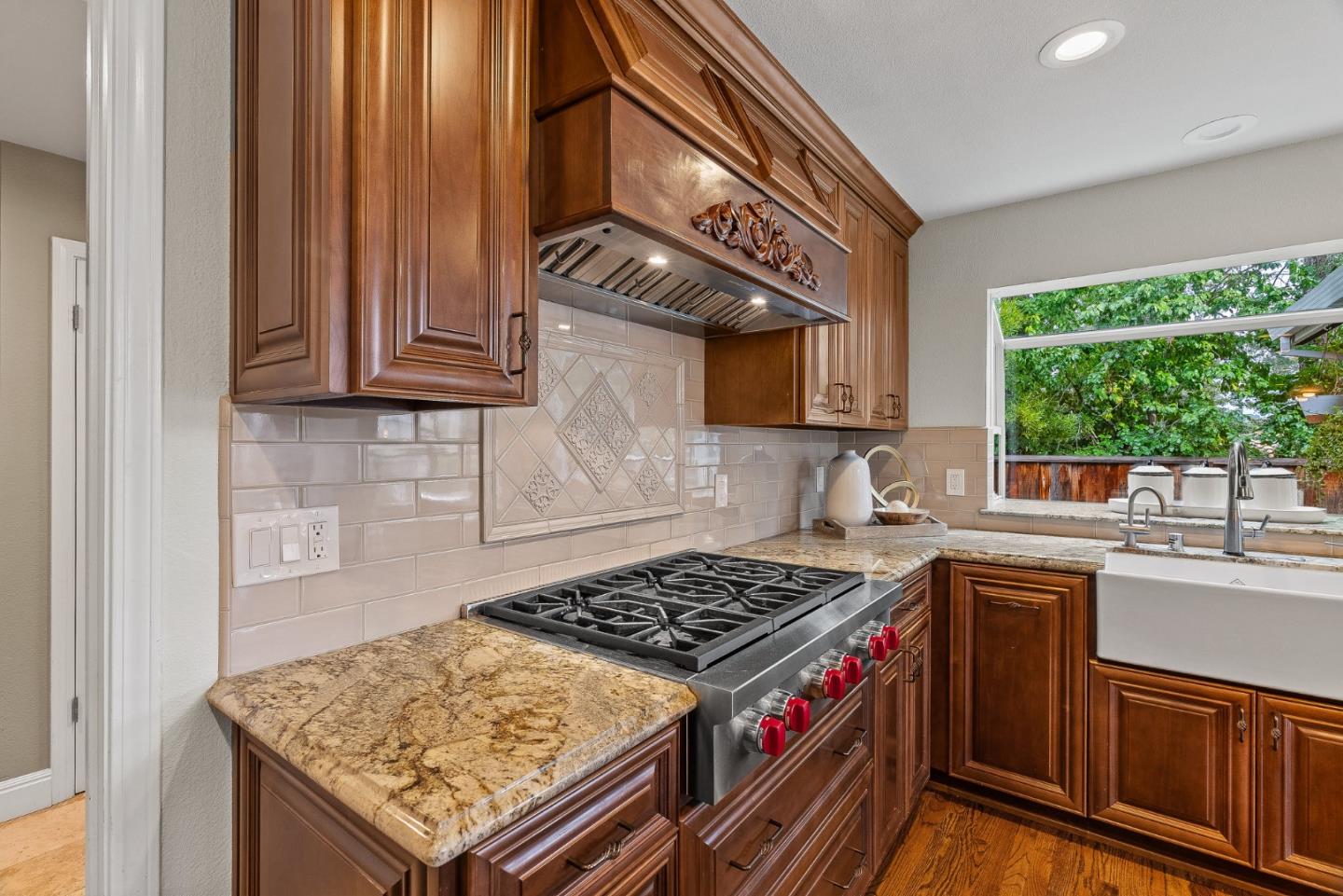15650 Michael Lane Monte Sereno, CA 95030 - Photo 18 of 54 a kitchen with a stove and a sink