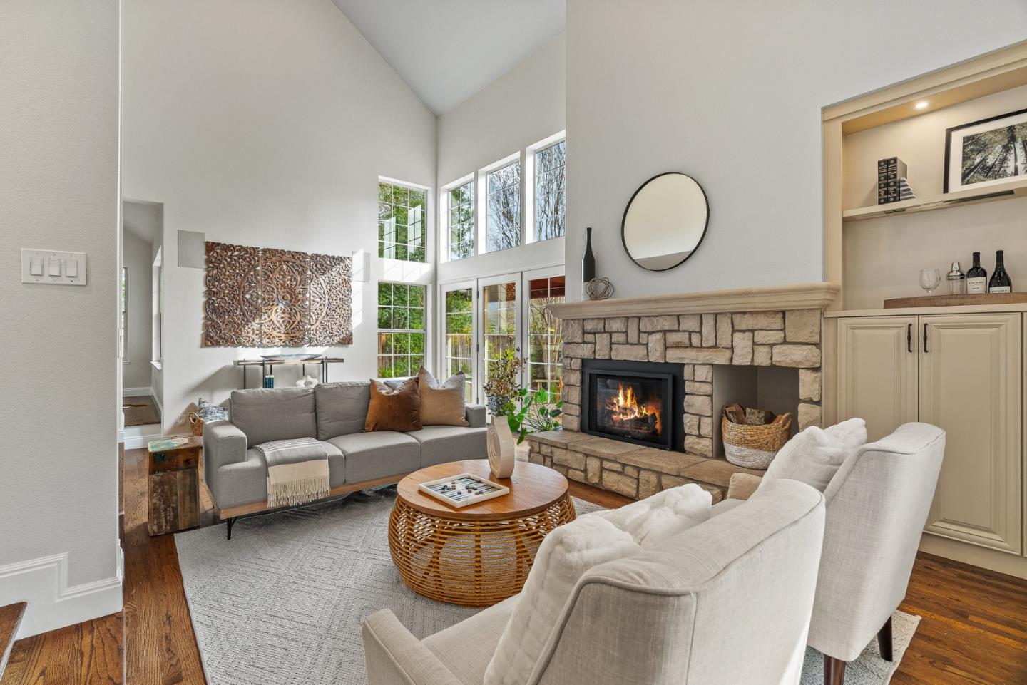 15650 Michael Lane Monte Sereno, CA 95030 - Photo 20 of 54 a living room with furniture a large window and a fireplace