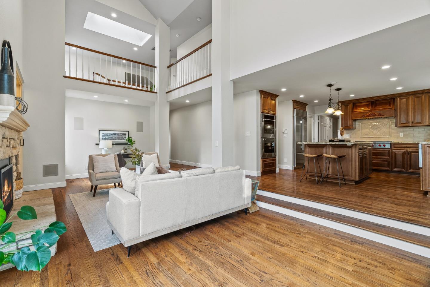 15650 Michael Lane Monte Sereno, CA 95030 - Photo 21 of 54 a living room with furniture and a wooden floor
