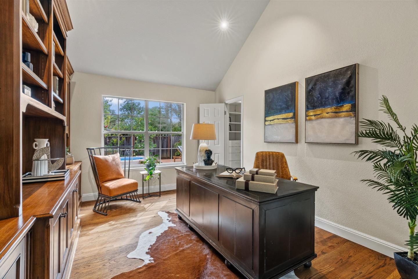 15650 Michael Lane Monte Sereno, CA 95030 - Photo 25 of 54 a living room with furniture and a window